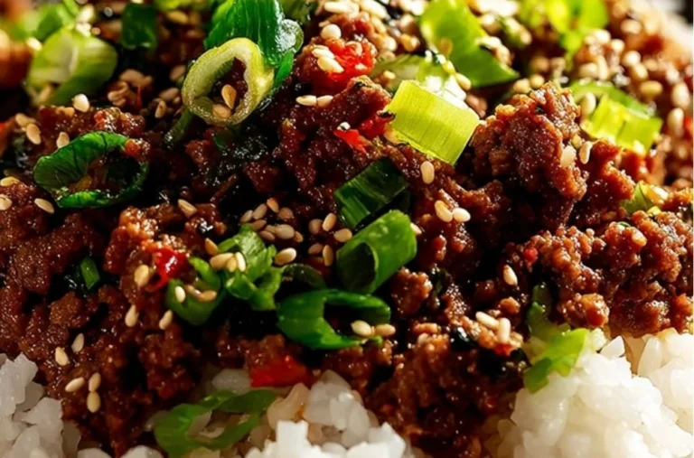 Delicious Korean ground beef bowl garnished with green onions and sesame seeds