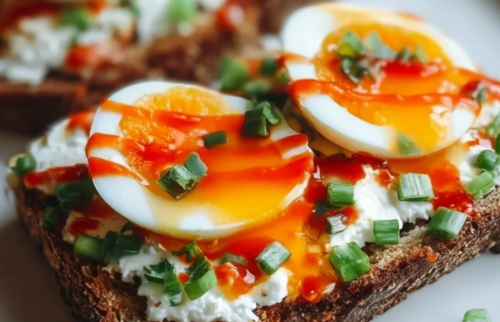 Cottage Cheese Toast topped with egg and sriracha for a nutritious meal