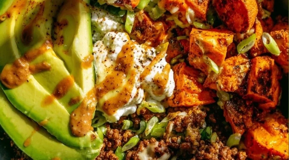 Ground Beef Hot Honey Bowl topped with fresh vegetables and drizzled with hot honey
